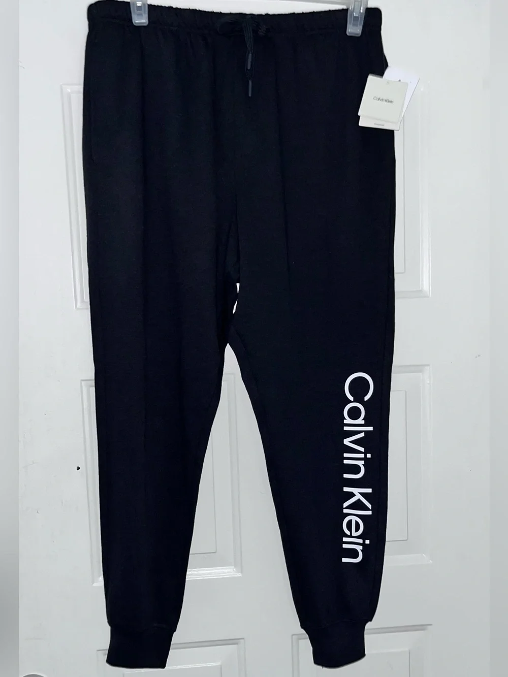 Calvin Klein nwt men’s Black sweats joggers with White Side Logo brand new nwt